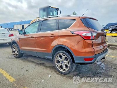 Drugie zdjęcie samochodu z przodu: 2017 FORD ESCAPE TITANIUM VIN:1FMCU0J92HUB23393 - miniatura