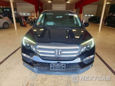Piąte zdjęcie samochodu w środku: 2017 HONDA PILOT EXL VIN:5FNYF6H54HB093686 - miniatura