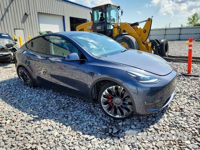 Czwarte zdjęcie samochodu z boku: 2021 TESLA MODEL Y VIN:5YJYGDEF5MF202195 - miniatura