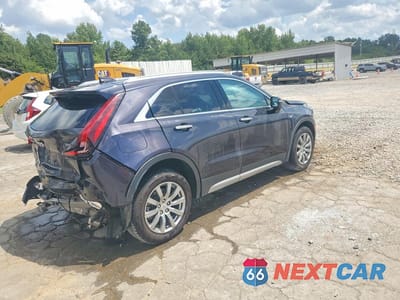Trzecie zdjęcie samochodu z tyłu: 2023 CADILLAC XT4 PREMIUM LUXURY VIN:1GYFZCR4XPF170391 - miniatura
