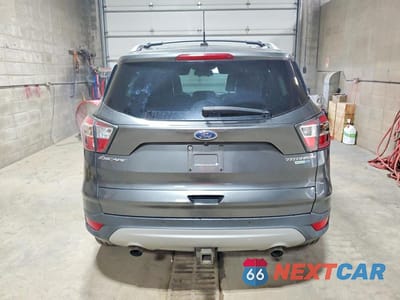 Zdjęcie 6 z 13 samochodu: 2017 FORD ESCAPE TITANIUM VIN:1FMCU9J97HUB33454 - miniatura