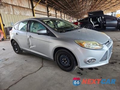 Czwarte zdjęcie samochodu z boku: 2012 FORD FOCUS SE VIN:1FAHP3K25CL452579 - miniatura