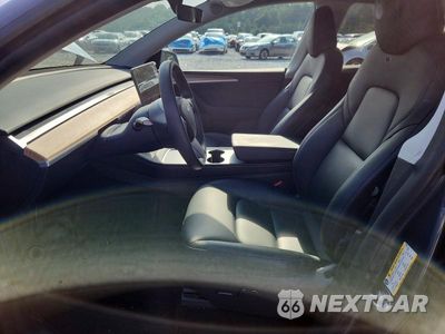 Zdjęcie 7 z 12 samochodu: 2023 TESLA MODEL Y VIN:7SAYGDEE6PA211659 - miniatura