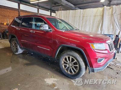 Czwarte zdjęcie samochodu z boku: 2014 JEEP GRAND CHEROKEE LIMITED VIN:1C4RJFBG4EC253152 - miniatura