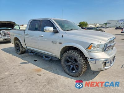 Czwarte zdjęcie samochodu z boku: 2017 RAM 1500 LARAMIE VIN:1C6RR7NT7HS678129 - miniatura