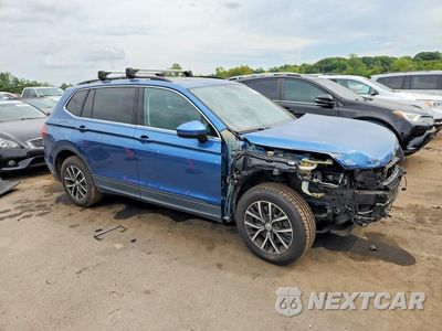 Czwarte zdjęcie samochodu z boku: 2019 VOLKSWAGEN TIGUAN SE VIN:3VV2B7AX7KM068921 - miniatura