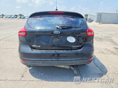 Zdjęcie 6 z 14 samochodu: 2017 FORD FOCUS TITANIUM VIN:1FADP3N29HL272524 - miniatura
