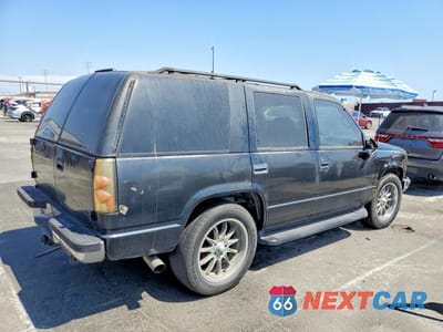 Trzecie zdjęcie samochodu z tyłu: 1996 GMC YUKON VIN:1GKEC13R7TJ713249 - miniatura
