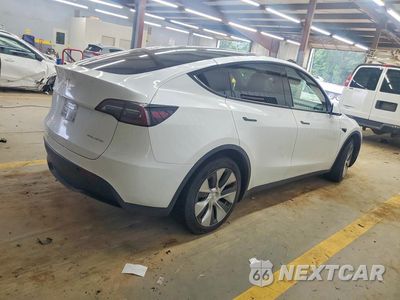 Trzecie zdjęcie samochodu z tyłu: 2023 TESLA MODEL Y VIN:7SAYGDEE7PF763657 - miniatura