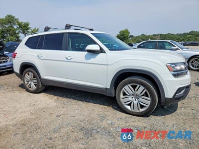 Czwarte zdjęcie samochodu z boku: 2019 VOLKSWAGEN ATLAS SEL VIN:1V2MR2CA1KC508209 - miniatura