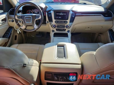 Zdjęcie 8 z 13 samochodu: 2016 GMC YUKON DENALI VIN:1GKS2CKJ8GR250252 - miniatura