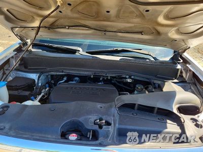 Zdjęcie 12 z 13 samochodu: 2011 HONDA PILOT EX VIN:5FNYF4H44BB064370 - miniatura