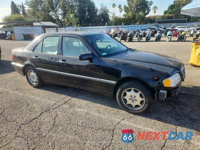 Czwarte zdjęcie samochodu z boku: 1999 MERCEDES-BENZ C 280 VIN:WDBHA29G6XA678640 - miniatura
