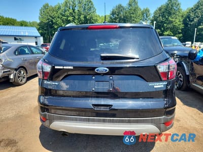 Zdjęcie 6 z 13 samochodu: 2017 FORD ESCAPE TITANIUM VIN:1FMCU9JD7HUE62613 - miniatura