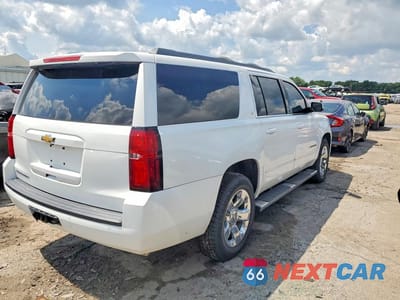 Trzecie zdjęcie samochodu z tyłu: 2016 CHEVROLET SUBURBAN K1500 LT VIN:1GNSKHKC4GR442589 - miniatura