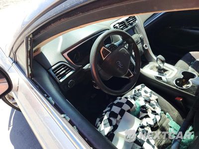 Zdjęcie 9 z 12 samochodu: 2016 FORD FUSION SE VIN:3FA6P0H72GR369367 - miniatura