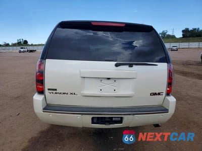 Zdjęcie 6 z 13 samochodu: 2011 GMC YUKON DENALI VIN:1GKS2MEF0BR394528 - miniatura