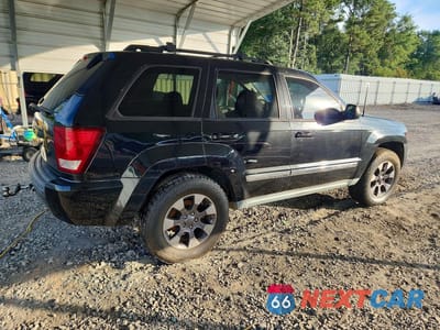 Trzecie zdjęcie samochodu z tyłu: 2010 JEEP GRAND CHEROKEE LAREDO VIN:1J4PS4GK2AC117953 - miniatura