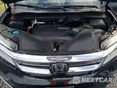 Zdjęcie 12 z 14 samochodu: 2020 HONDA PILOT TOURING VIN:5FNYF6H95LB004283 - miniatura