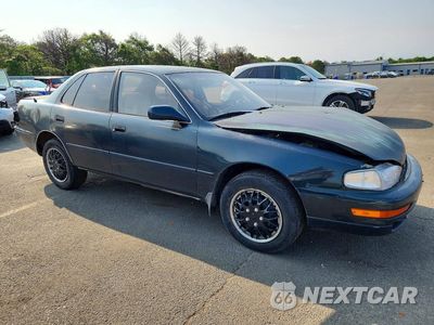 Czwarte zdjęcie samochodu z boku: 1994 TOYOTA CAMRY LE VIN:4T1SK12E5RU445837 - miniatura