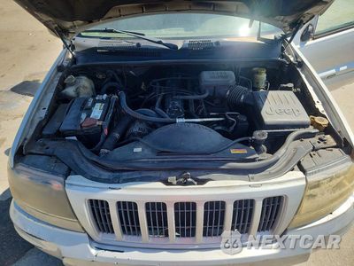 Zdjęcie 12 z 13 samochodu: 2004 JEEP GRAND CHEROKEE LAREDO VIN:1J4GX48S04C386019 - miniatura