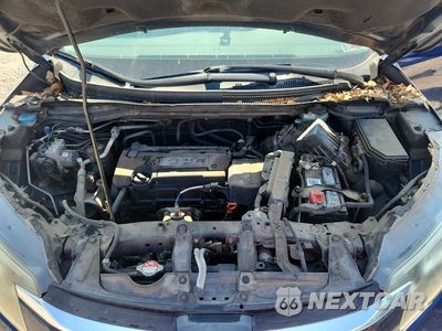 Zdjęcie 12 z 14 samochodu: 2015 HONDA CR-V EXL VIN:2HKRM4H73FH655995 - miniatura