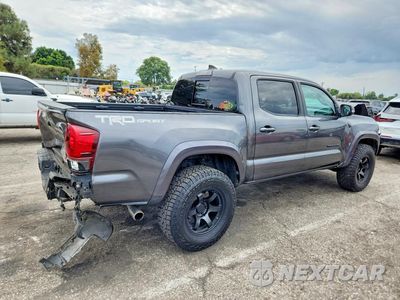 Trzecie zdjęcie samochodu z tyłu: 2019 TOYOTA TACOMA TRD SPORT VIN:3TMAZ5CNXKM092586 - miniatura