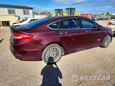 Trzecie zdjęcie samochodu z tyłu: 2017 FORD FUSION TITANIUM PHEV VIN:3FA6P0SU6HR180673 - miniatura