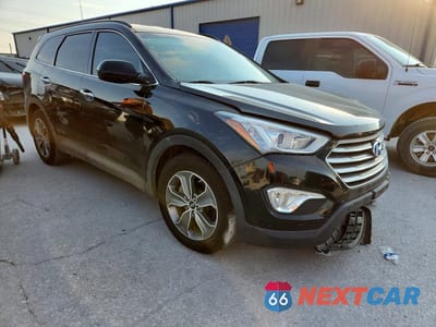 Czwarte zdjęcie samochodu z boku: 2016 HYUNDAI SANTA FE VIN:KM8SM4HF4GU148714 - miniatura
