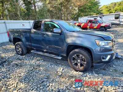 Czwarte zdjęcie samochodu z boku: 2015 CHEVROLET COLORADO Z71 VIN:1GCHTCE30F1199374 - miniatura