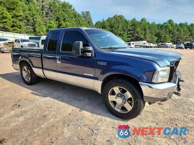 Czwarte zdjęcie samochodu z boku: 2004 FORD F350 SRW SUPER DUTY VIN:1FTSX30P74EA08303 - miniatura