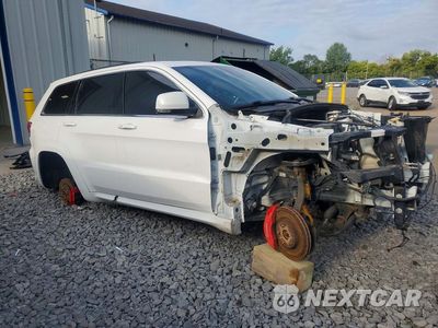 Czwarte zdjęcie samochodu z boku: 2015 JEEP GRAND CHEROKEE SRT-8 VIN:1C4RJFDJ6FC951403 - miniatura