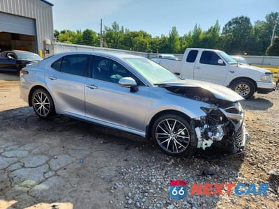 Czwarte zdjęcie samochodu z boku: 2024 TOYOTA CAMRY HYBRID SE VIN:4T1S31AK7RU622411 - miniatura