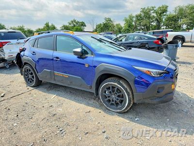 Czwarte zdjęcie samochodu z boku: 2024 SUBARU CROSSTREK WILDERNESS VIN:4S4GUHU60R3844613 - miniatura