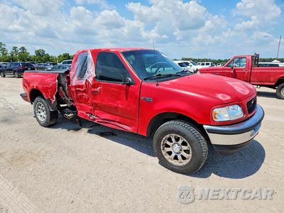 Czwarte zdjęcie samochodu z boku: 1997 FORD F150 LARIAT VIN:1FTDX0760VKD19286 - miniatura