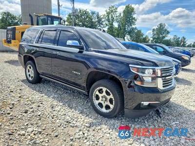 Czwarte zdjęcie samochodu z boku: 2018 CHEVROLET TAHOE K1500 PREMIER VIN:1GNSKCKC1JR103475 - miniatura