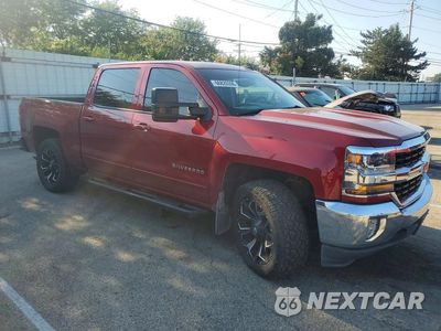Czwarte zdjęcie samochodu z boku: 2018 CHEVROLET SILVERADO K1500 LT VIN:3GCUKRECXJG550290 - miniatura