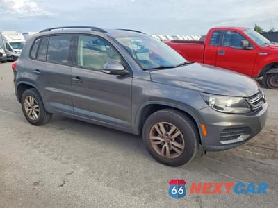 Czwarte zdjęcie samochodu z boku: 2016 VOLKSWAGEN TIGUAN S VIN:WVGAV7AX7GW559266 - miniatura