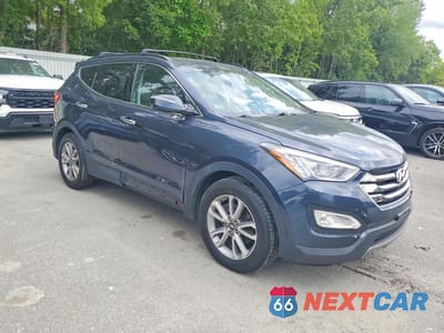 Czwarte zdjęcie samochodu z boku: 2015 HYUNDAI SANTA FE SPORT 2.0T VIN:5XYZUDLA8FG287629 - miniatura