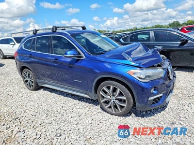 Czwarte zdjęcie samochodu z boku: 2018 BMW X1 SDRIVE28I VIN:WBXHU7C30J5L05558 - miniatura