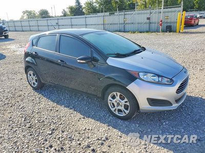 Czwarte zdjęcie samochodu z boku: 2014 FORD FIESTA SE VIN:3FADP4EJ4EM226705 - miniatura