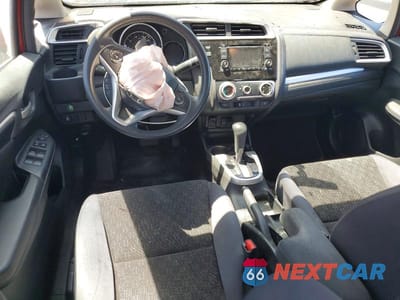 Zdjęcie 8 z 13 samochodu: 2016 HONDA FIT LX VIN:JHMGK5H53GS003008 - miniatura
