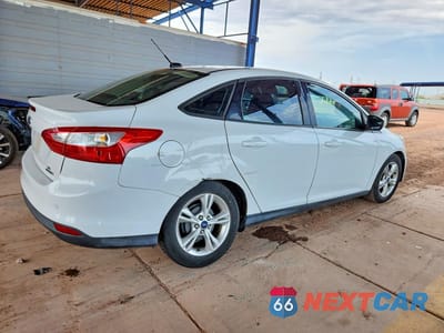 Trzecie zdjęcie samochodu z tyłu: 2014 FORD FOCUS SE VIN:1FADP3F27EL382398 - miniatura