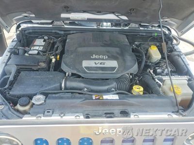 Zdjęcie 12 z 14 samochodu: 2015 JEEP WRANGLER UNLIMITED SAHARA VIN:1C4BJWEG0FL537960 - miniatura