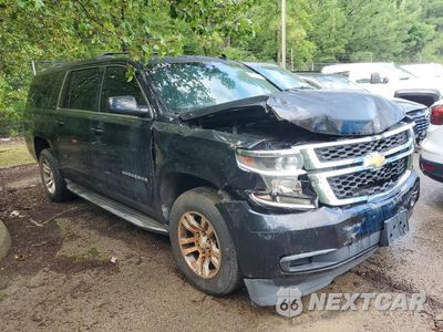 Czwarte zdjęcie samochodu z boku: 2015 CHEVROLET SUBURBAN K1500 LT VIN:1GNSKJKCXFR236117 - miniatura