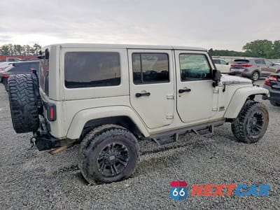 Trzecie zdjęcie samochodu z tyłu: 2014 JEEP WRANGLER UNLIMITED SAHARA VIN:1C4HJWEG8EL182450 - miniatura