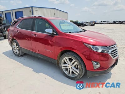 Czwarte zdjęcie samochodu z boku: 2019 CHEVROLET EQUINOX PREMIER VIN:2GNAXYEX1K6169725 - miniatura