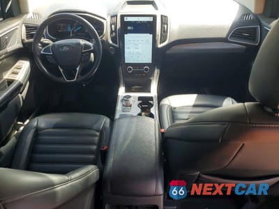 Zdjęcie 8 z 13 samochodu: 2021 FORD EDGE SEL VIN:2FMPK3J96MBA00477 - miniatura