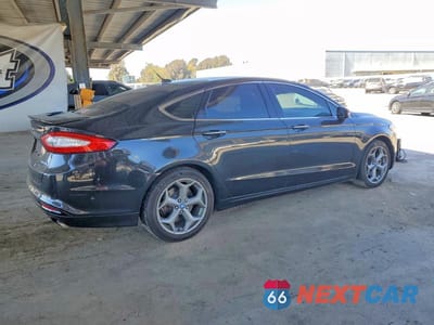 Trzecie zdjęcie samochodu z tyłu: 2014 FORD FUSION TITANIUM PHEV VIN:3FA6P0SU5ER195287 - miniatura