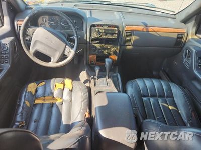 Zdjęcie 8 z 13 samochodu: 1999 JEEP GRAND CHEROKEE LIMITED VIN:1J4GW68S6XC582730 - miniatura